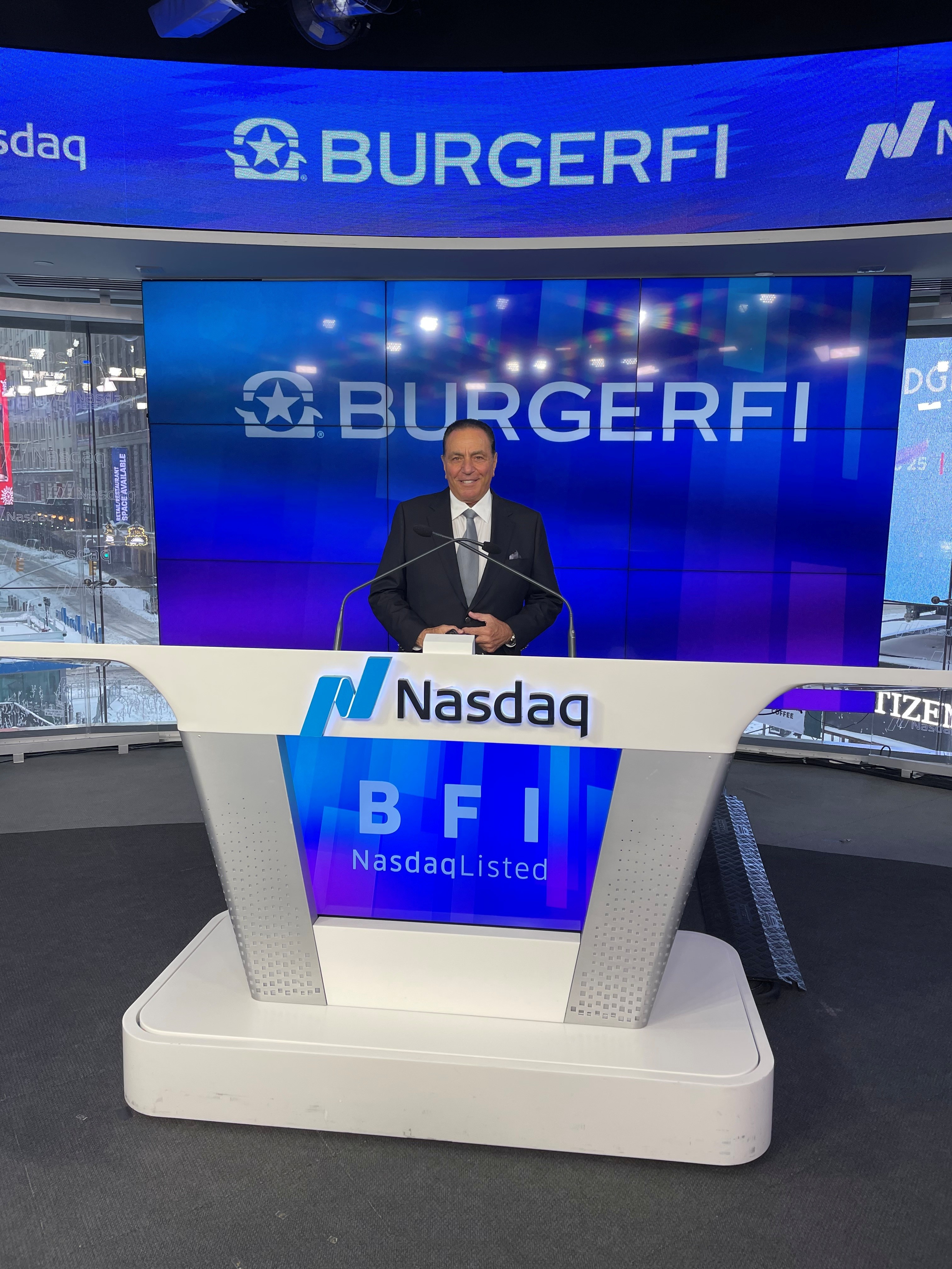 John Rosatti at the Nasdaq podium for BurgerFi